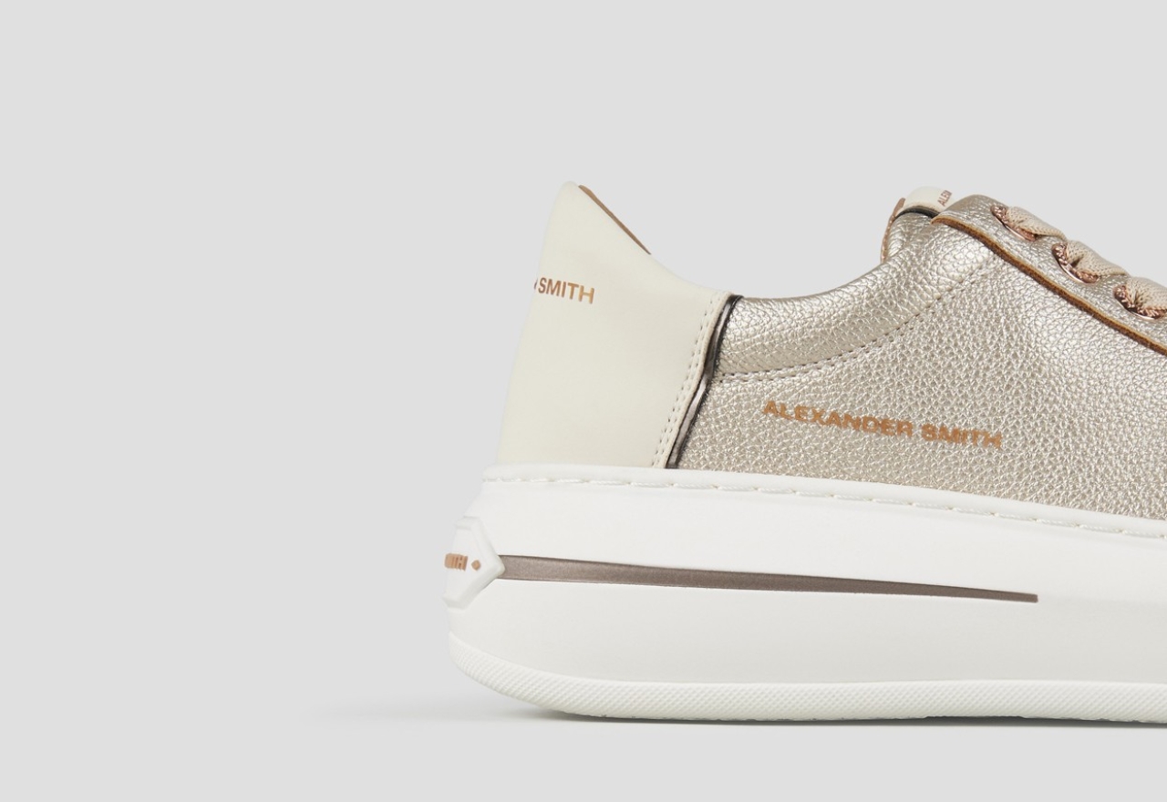 Lancaster Woman in laminated bottalato gold leather and white heel - Main Image